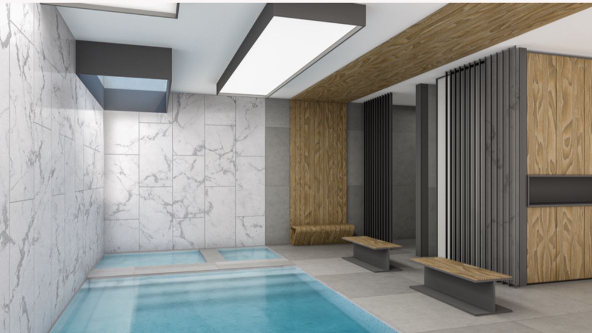 Spa met verwarmd binnenzwembad en marmeren wanden