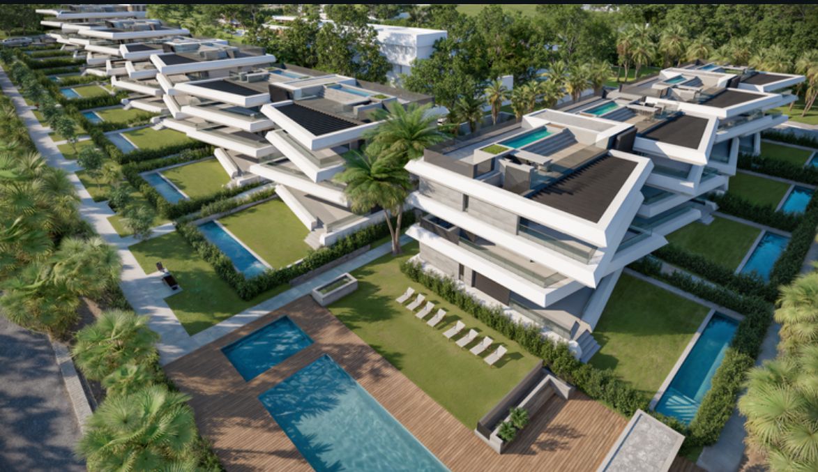 Luchtfoto van Palm Residences Estepona met tuinen en zwembaden